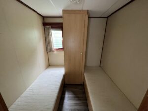 Mobil-Home « Chalet Wood Gray » 10,8 x 3,7m – Design Moderne avec Bow-Window & Double Entrée