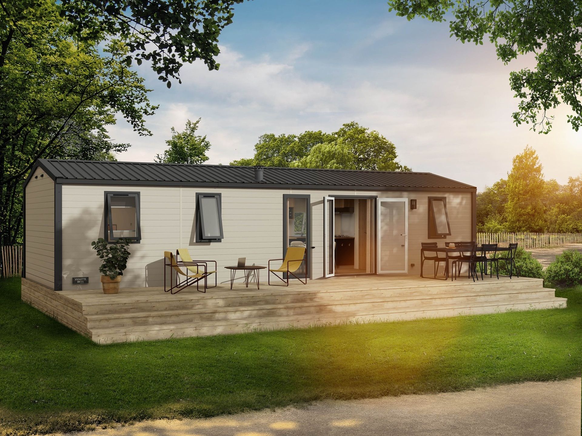 Terrasse d'un mobile home au coucher du soleil